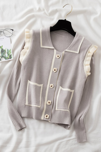 Naiste taskute ja lokkidega kardigan