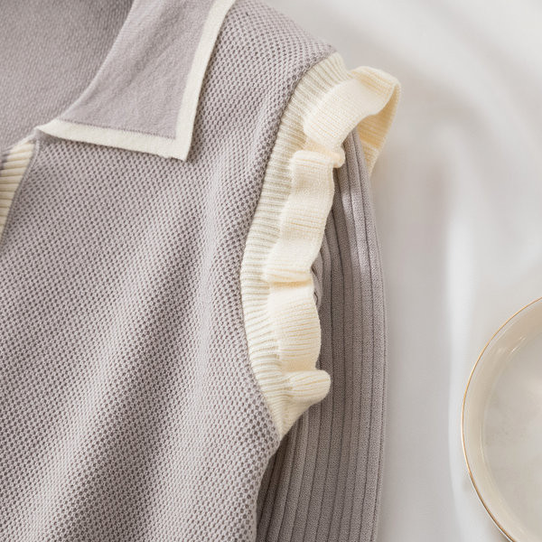 Naiste taskute ja lokkidega kardigan