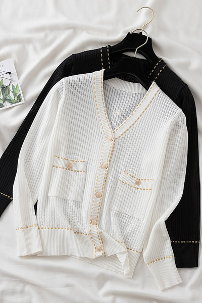 Aktualan ženski prsluk sa džepovima i gumbima