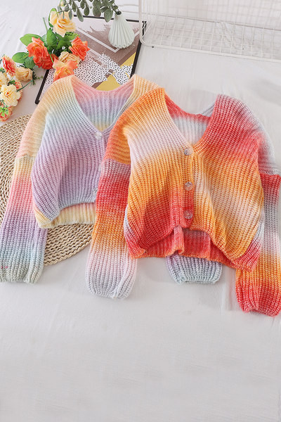 Naiste silmkoeline sillerdavates toonides nööpidega vest