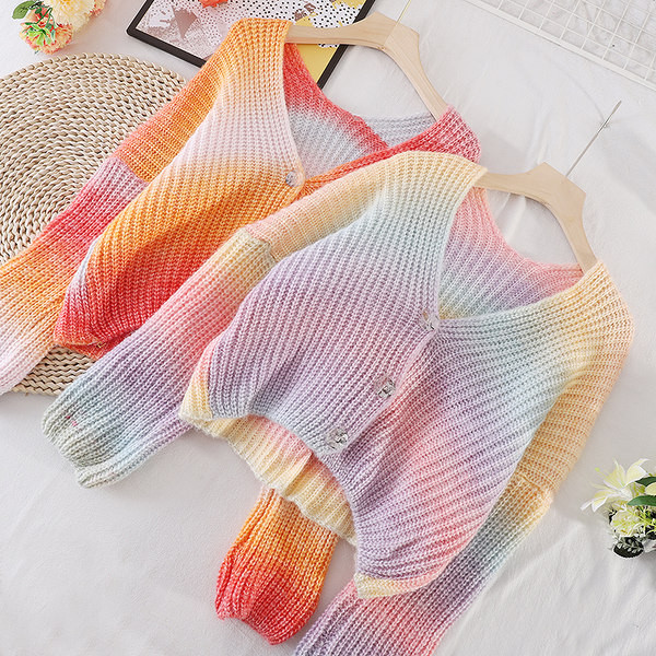 Naiste silmkoeline sillerdavates toonides nööpidega vest