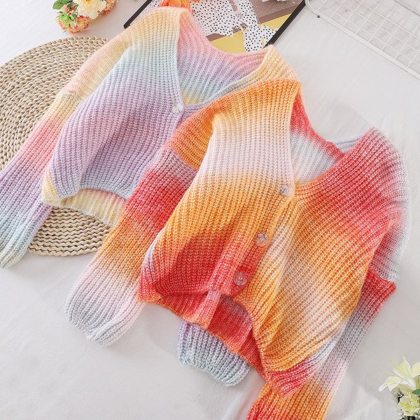 Naiste silmkoeline sillerdavates toonides nööpidega vest