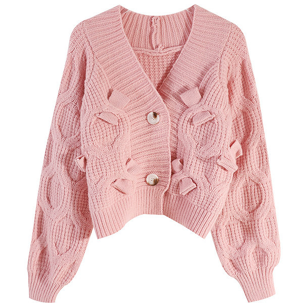 Mitmes värvitoonis kootud naiste kampsun ja nööbid