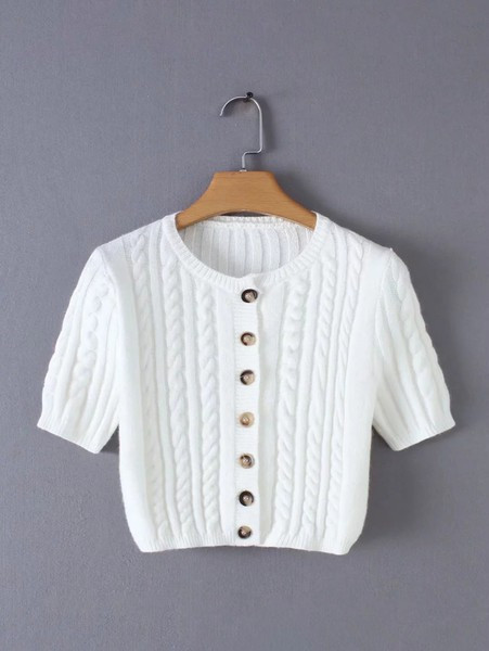 Lühike kootud vest nööpide ja lühikeste varrukatega
