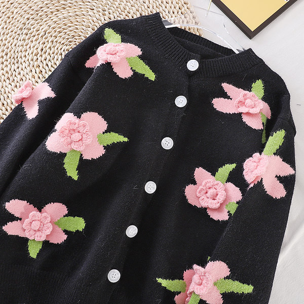 Női kardigán gombokkal és 3D elemmel fekete színben