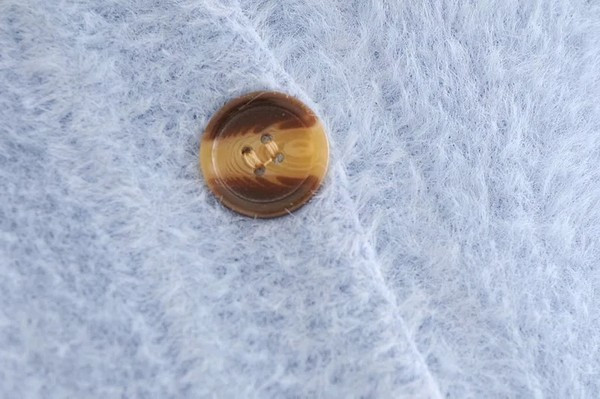 Lühike nööpidega sulevest