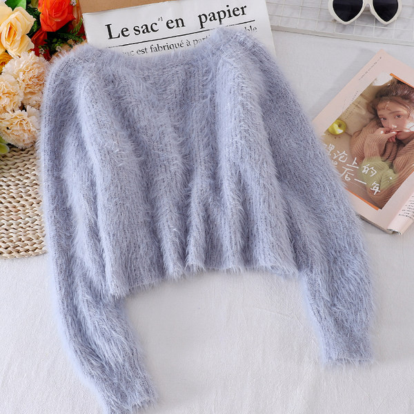 Női pehelymellény gombokkal és spitz nyakkivágással