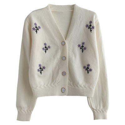 Modern mellény hímzéssel és spitz nyakkivágással