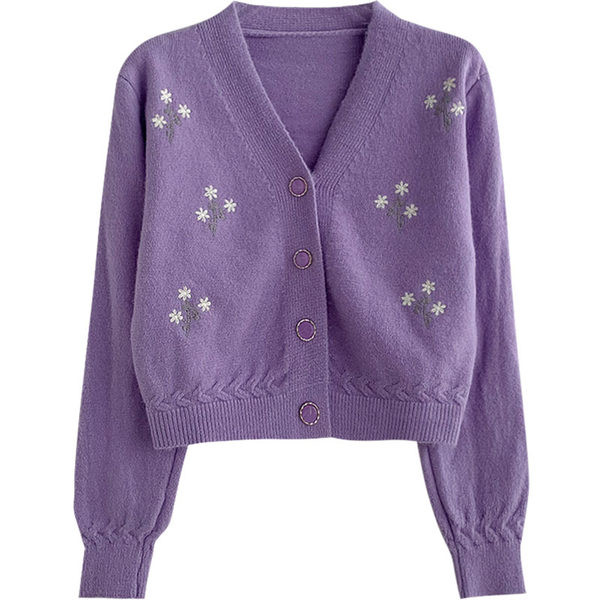 Modern mellény hímzéssel és spitz nyakkivágással