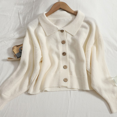 Γυναικεία ζακέτα νέο μοντέλο με φαρδιά μανίκια και στρογγυλά κουμπιά