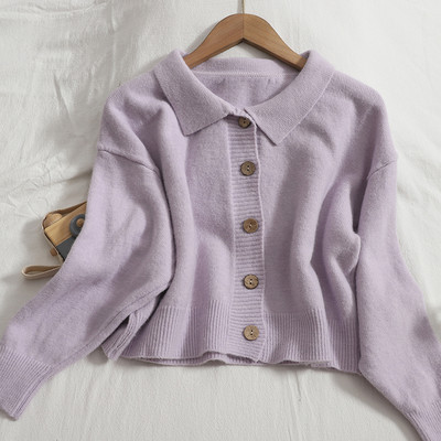 Γυναικεία ζακέτα νέο μοντέλο με φαρδιά μανίκια και στρογγυλά κουμπιά