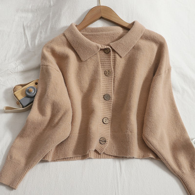 Γυναικεία ζακέτα νέο μοντέλο με φαρδιά μανίκια και στρογγυλά κουμπιά