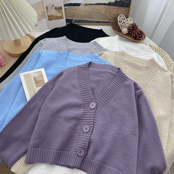 Μονόχρωμη γυναικεία κοντή ζακέτα με spitz λαιμόκοψη