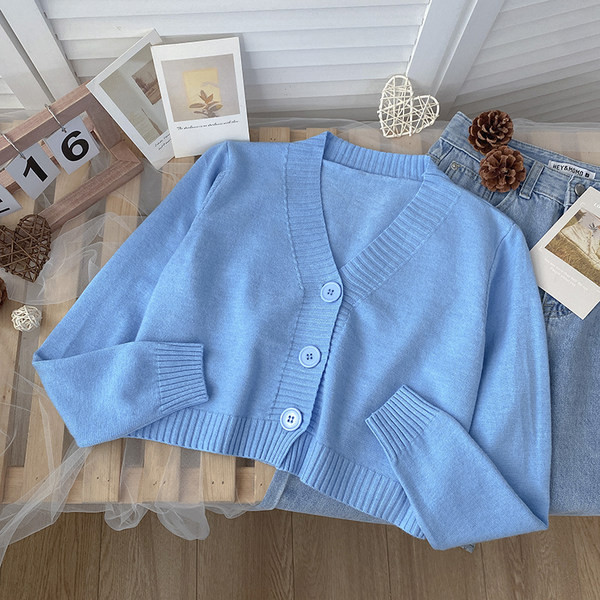 Μονόχρωμη γυναικεία κοντή ζακέτα με spitz λαιμόκοψη