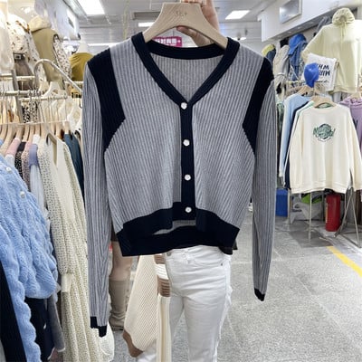 Naiste sügisvest pikkade varrukate ja nööpidega