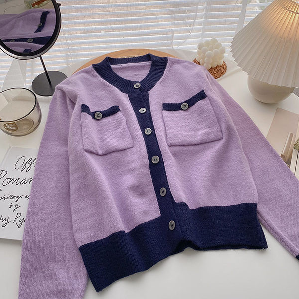 Taskute ja ümara kaelusega vabaaja vest