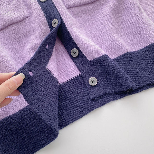 Taskute ja ümara kaelusega vabaaja vest