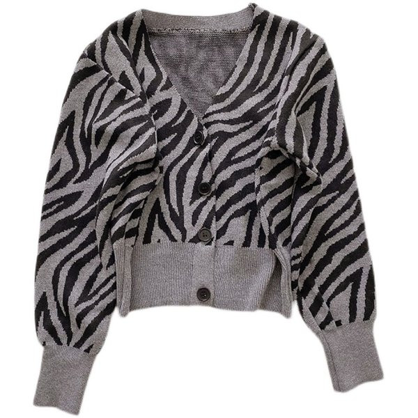 Kötött mellény gombokkal és spitz nyakkivágással