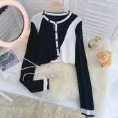 Naiste moodne nööpide ja ovaalse kaelusega vest