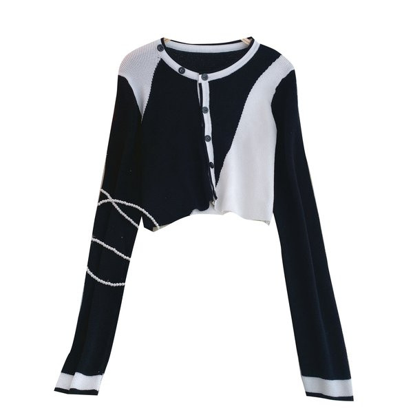 Naiste moodne nööpide ja ovaalse kaelusega vest