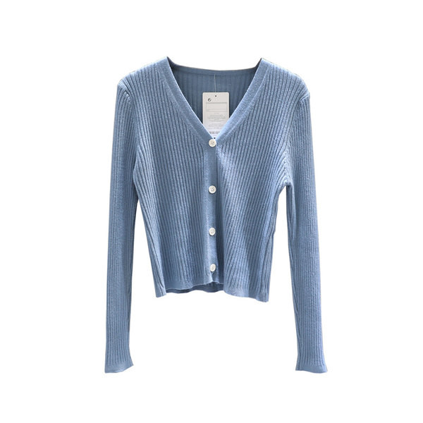 Kötött mellény V-nyakkal és gombokkal nőknek