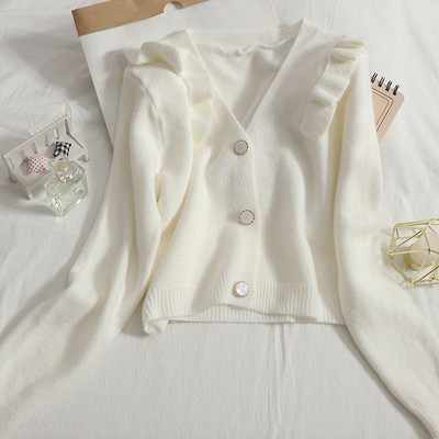 Νέο μοντέλο πλεκτή ζακέτα  με στρογγυλά κουμπιά και λαιμόκοψη spitz