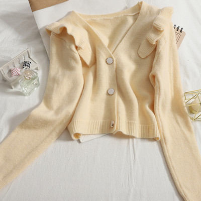 Νέο μοντέλο πλεκτή ζακέτα  με στρογγυλά κουμπιά και λαιμόκοψη spitz