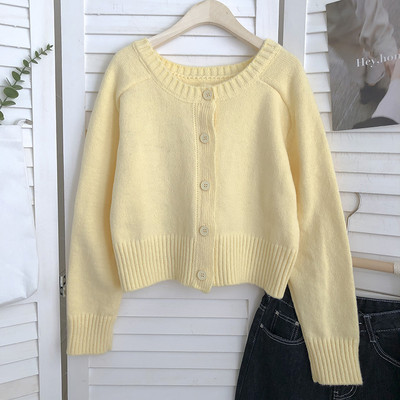 Γυναικεία πλεκτή ζακέτα  με κουμπιά και στρογγυλή λαιμόκοψη