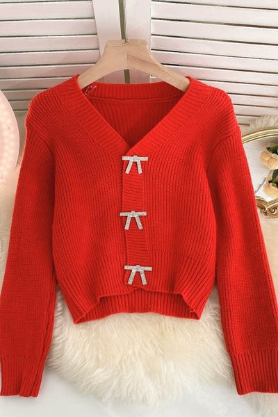 Női kardigán több színben szalaggal