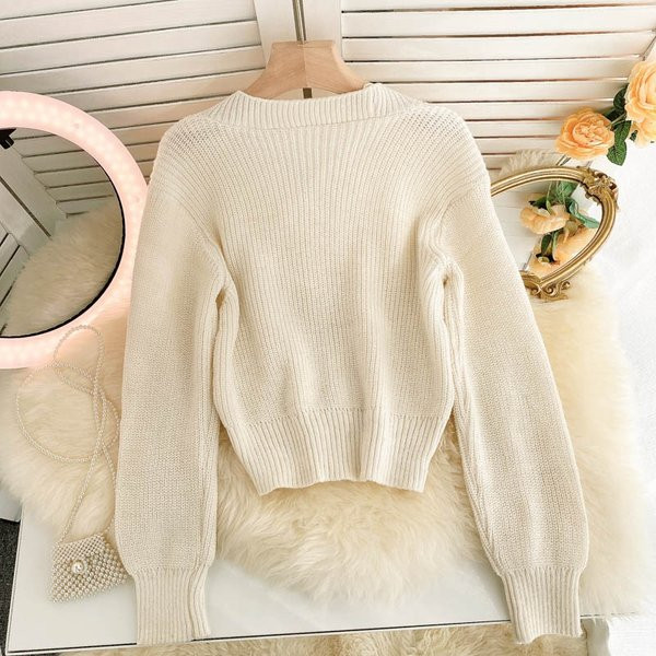 Női kardigán több színben szalaggal