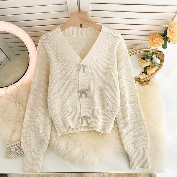 Női kardigán több színben szalaggal