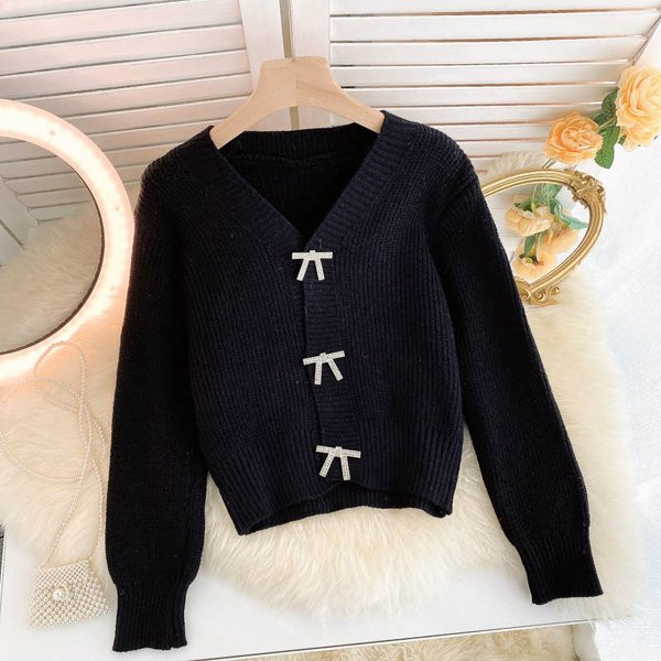 Női kardigán több színben szalaggal