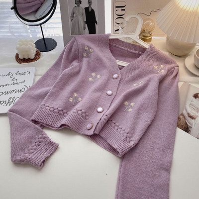 Vabaaja vest pikkade varrukate ja spitsikaelusega