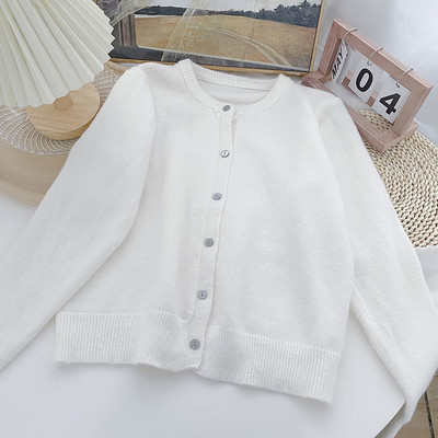 Γυναικεία φθινοπωρινή ζακέτα με κουμπιά και στρογγυλή λαιμόκοψη