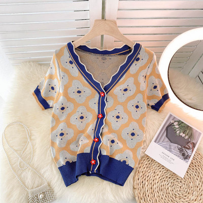 Γυναικεία ζακέτα με κοντά μανίκια και κουμπιά