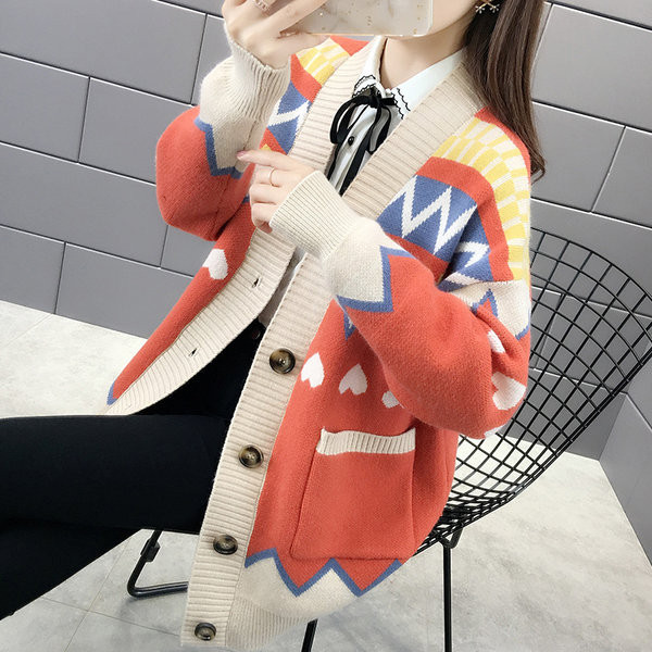 Naiste lai nööpide ja taskutega vest