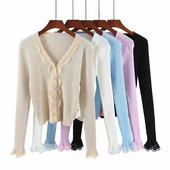 Liibuv velvetist nööpide ja lokkidega vest