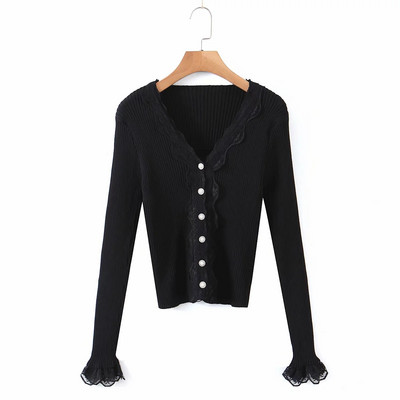 Liibuv velvetist nööpide ja lokkidega vest