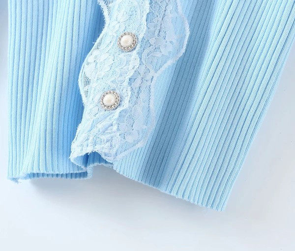 Liibuv velvetist nööpide ja lokkidega vest