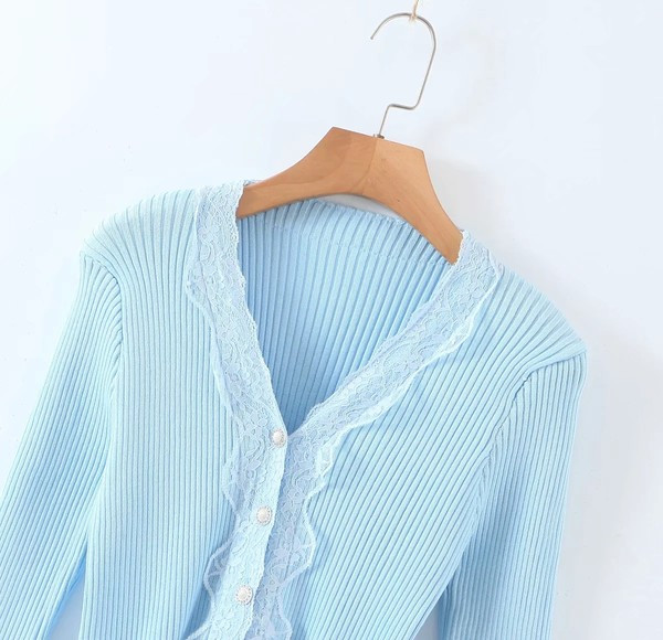 Liibuv velvetist nööpide ja lokkidega vest