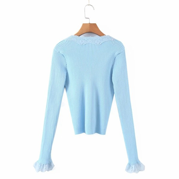 Liibuv velvetist nööpide ja lokkidega vest