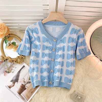 Ovaalse dekoltee ja lühikeste varrukatega naiste vest