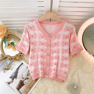 Ovaalse dekoltee ja lühikeste varrukatega naiste vest