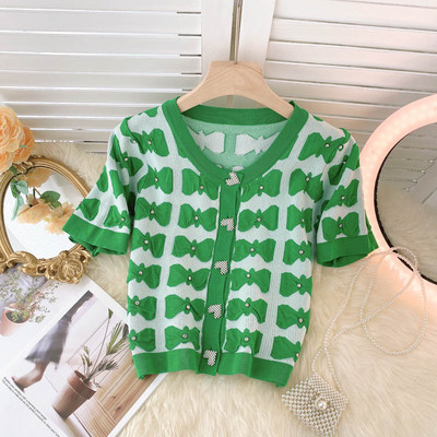 Ovaalse dekoltee ja lühikeste varrukatega naiste vest