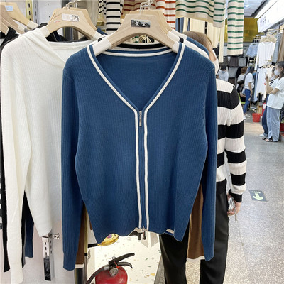 Μοντέρνα γυναικεία ζακέτα με μακριά μανίκια και φερμουάρ