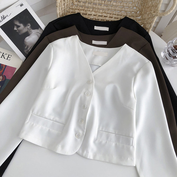 Lühike naiste sügisvest spitsikaelusega