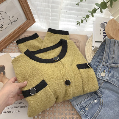 Casual γυναικεία ζακέτα με μαύρα κουμπιά