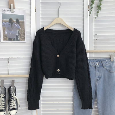 Lühikese mudeliga naiste kootud vest