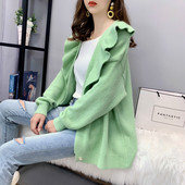 Naiste pikkade varrukate ja lokkidega kootud kardigan