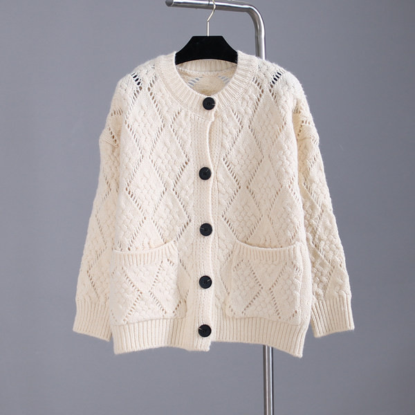 Naiste kootud vest taskute ja ümara kaelusega